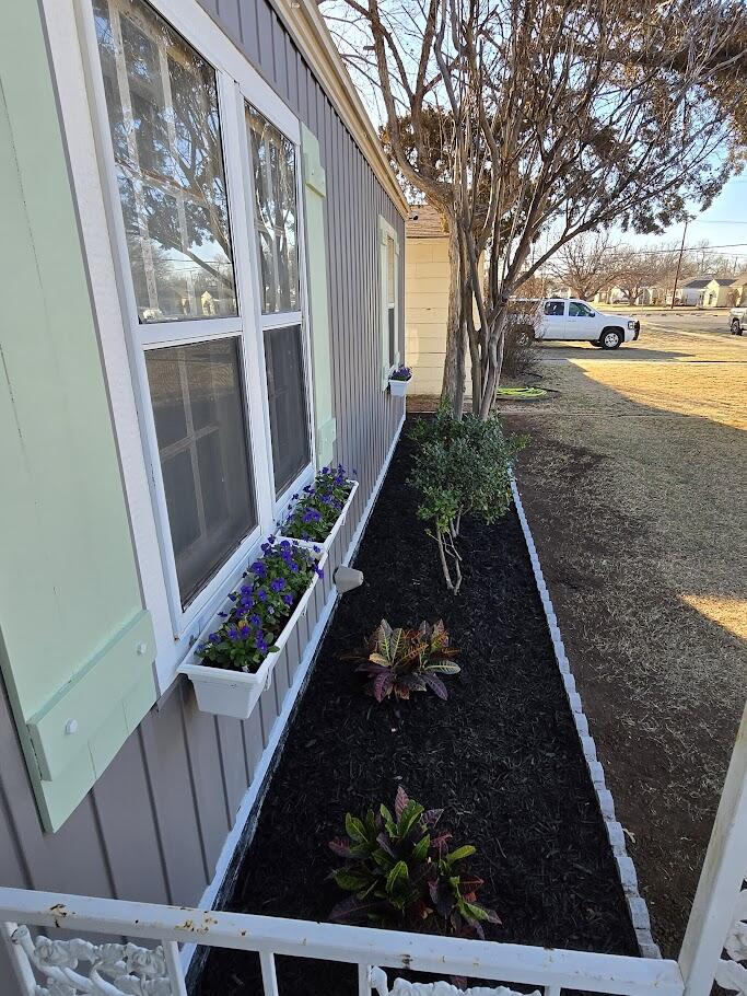 3315 27th Street Lubbock, TX 79410 - Photo 4 of 32 a view of a backyard with garden