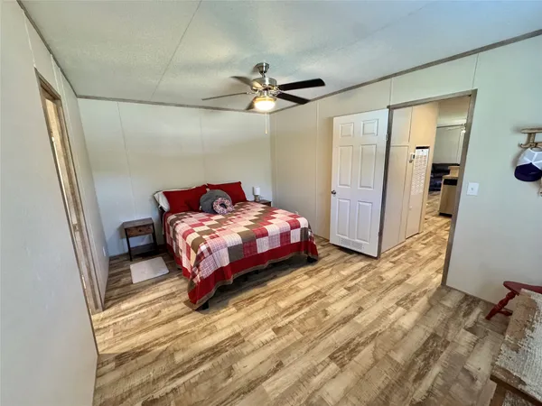 a kitchen with stainless steel appliances a refrigerator a stove a sink a microwave and cabinets