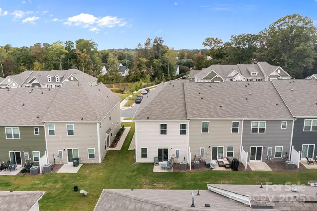 a aerial view of a house with a garden and plants