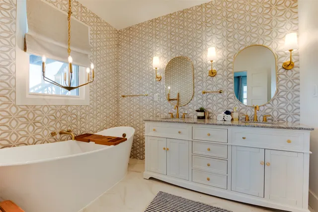 a bathroom with a double vanity sink and a bathtub