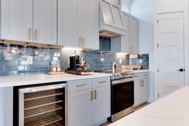 a view of kitchen with furniture and wooden floor