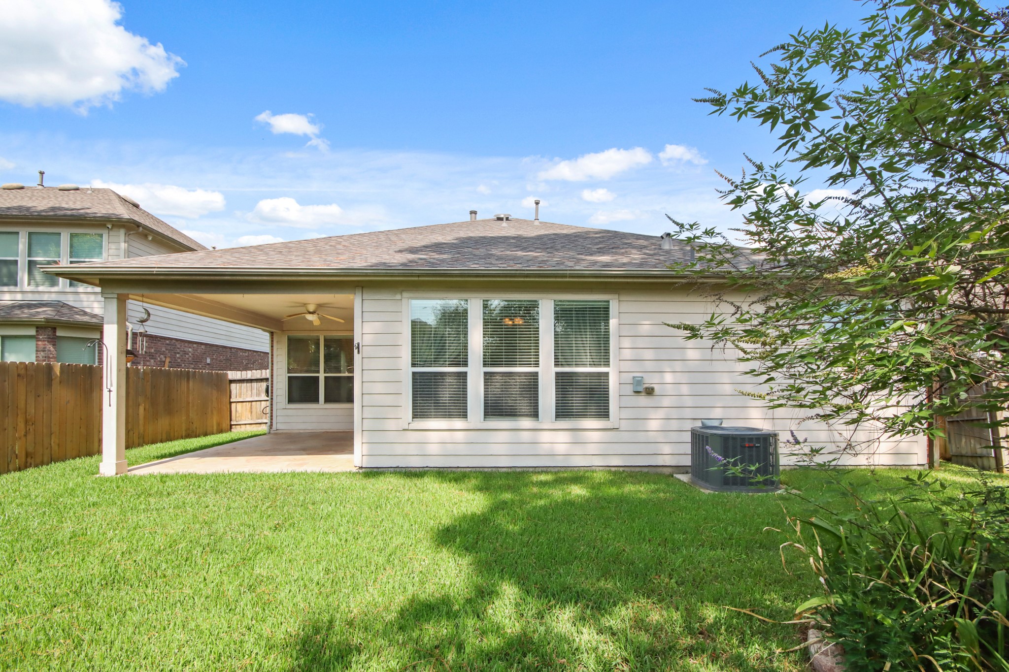 16918 Cherokee Lake Lane Houston, TX 77044 - Photo 28 of 35 front view of a house with a yard