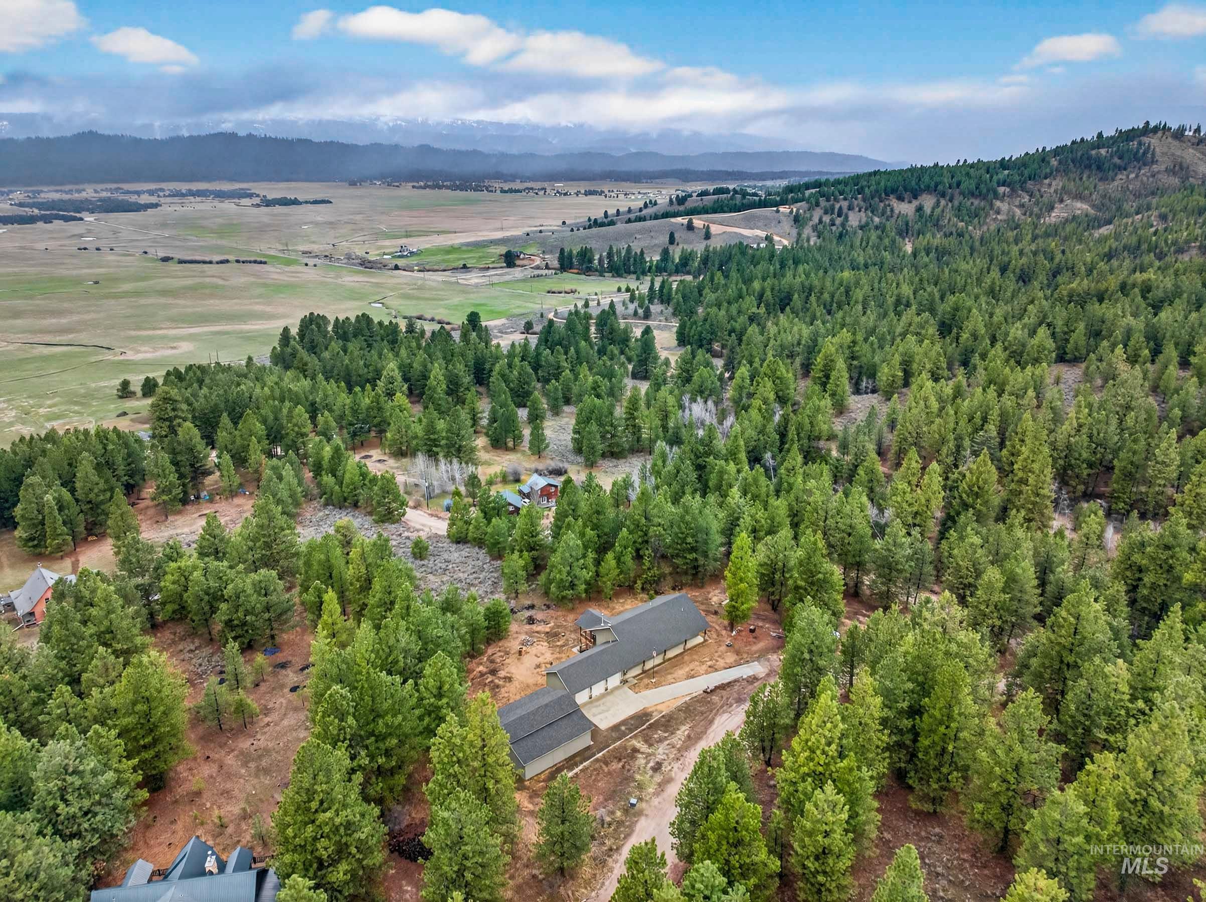 10191 Timberrim Drive Cascade, ID 83611 - Photo 42 of 44 Drone / aerial view of a mountainous background