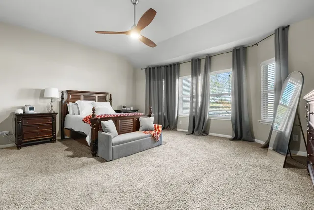 a bed room with a bed and a view