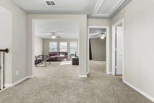 a view of a livingroom with livingroom and furniture