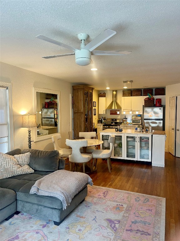 406 East Monroe Street, Unit A Austin, TX 78704 - Photo 11 of 35 a living room with lots of furniture and view of kitchen