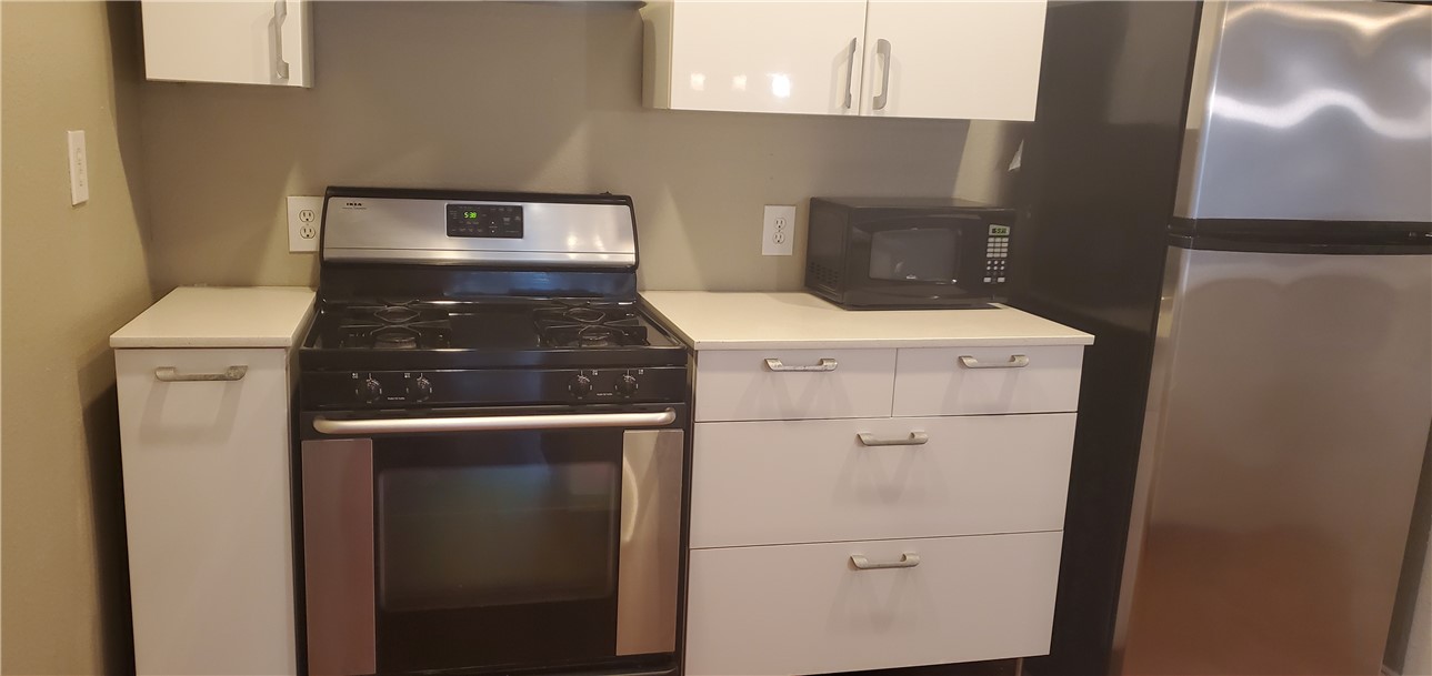 406 East Monroe Street, Unit A Austin, TX 78704 - Photo 22 of 35 a close view of washer and dryer