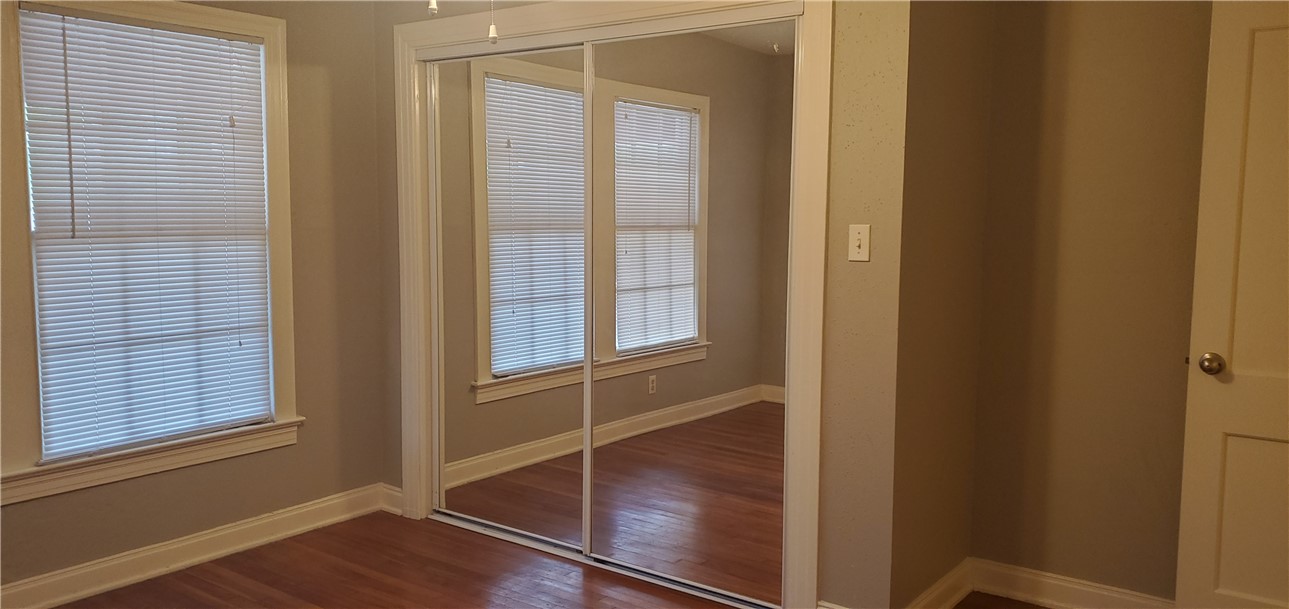 406 East Monroe Street, Unit A Austin, TX 78704 - Photo 27 of 35 a view of front door with wooden floor