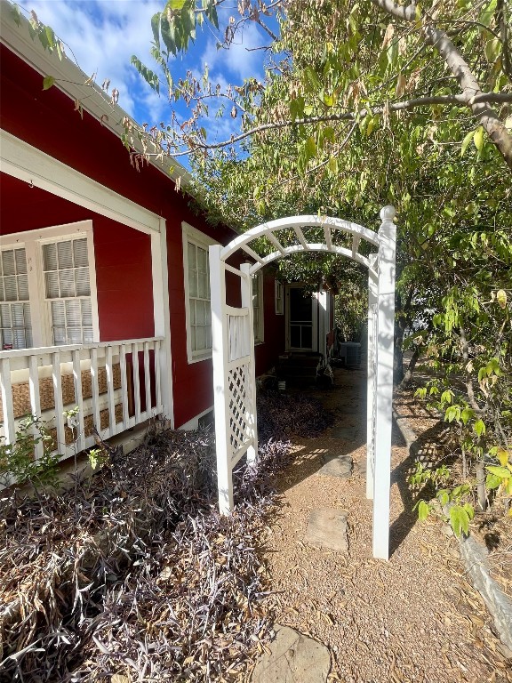 406 East Monroe Street, Unit A Austin, TX 78704 - Photo 7 of 35 a view of a porch with a table and chairs