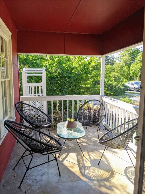 406 East Monroe Street, Unit A Austin, TX 78704 - Photo 8 of 35 a view of a chairs and table in patio