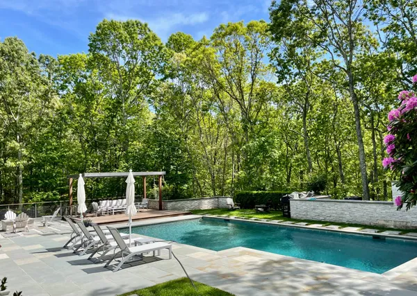 a garden view with a seating space