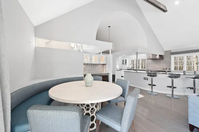 a view of kitchen with cabinets and wooden floor
