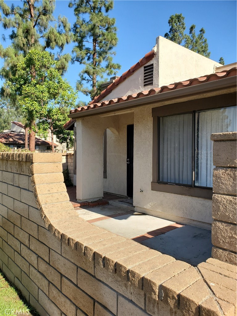 7864 Portola Road Rancho Cucamonga, CA 91730 - Photo 29 of 37 a view of a house with a patio