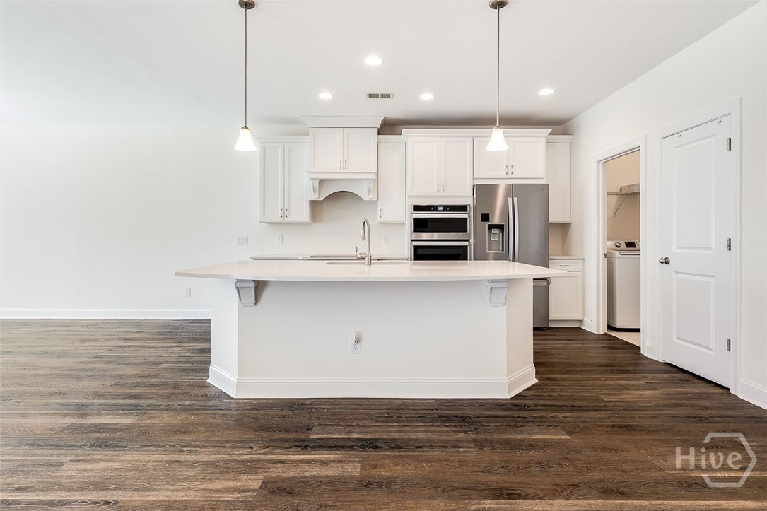 107 Merribee Lane Pooler, GA 31322 - Photo 12 of 46 The gourmet kitchen will make cooking time much more enjoyable, and tons of counter space with beautiful, and low maintenance Quartz counter tops.
