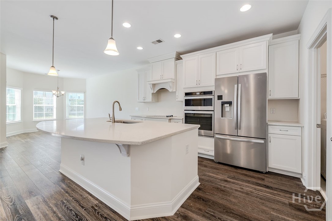 107 Merribee Lane Pooler, GA 31322 - Photo 14 of 46 Upgraded french-door refrigerator and and built-in oven and microwave.