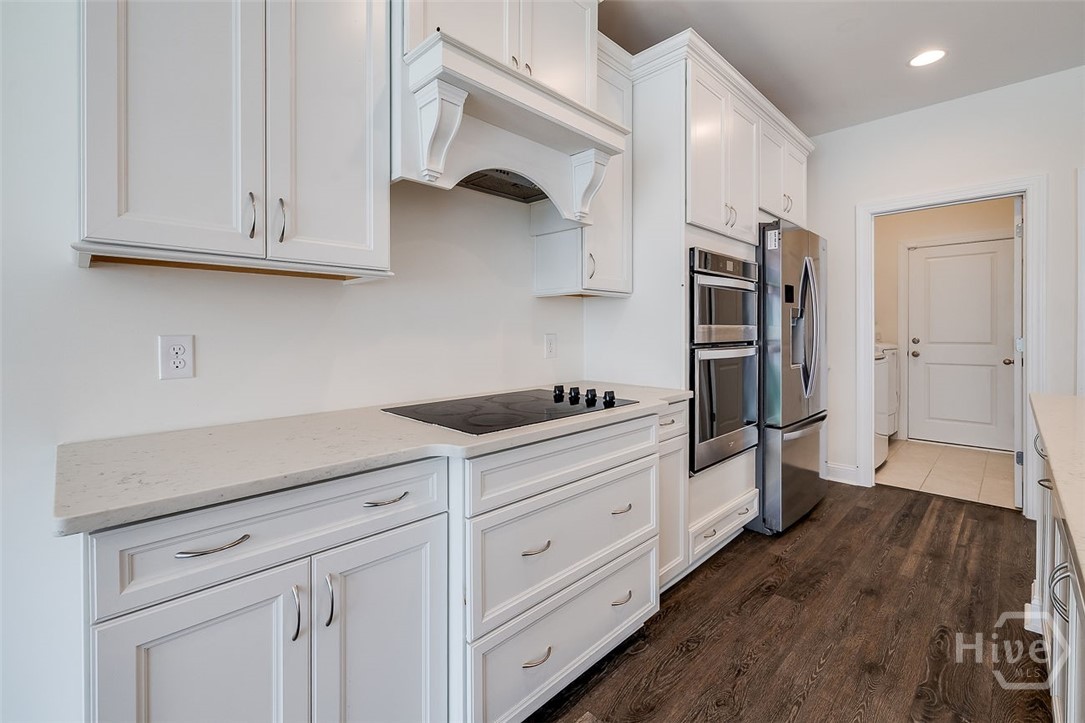 107 Merribee Lane Pooler, GA 31322 - Photo 16 of 46 Glass, cook tup and a vented hood for cooking ease! Plenty of cabinet space also.