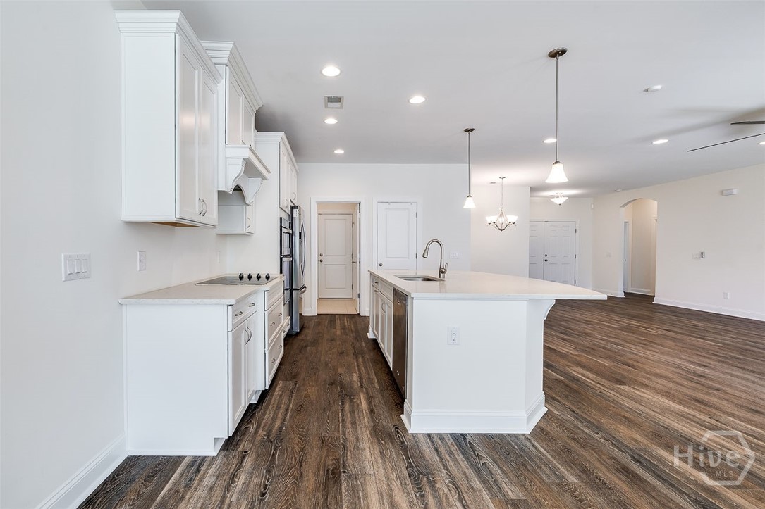 107 Merribee Lane Pooler, GA 31322 - Photo 18 of 46 On the far end of kitchen is the pantry door.
