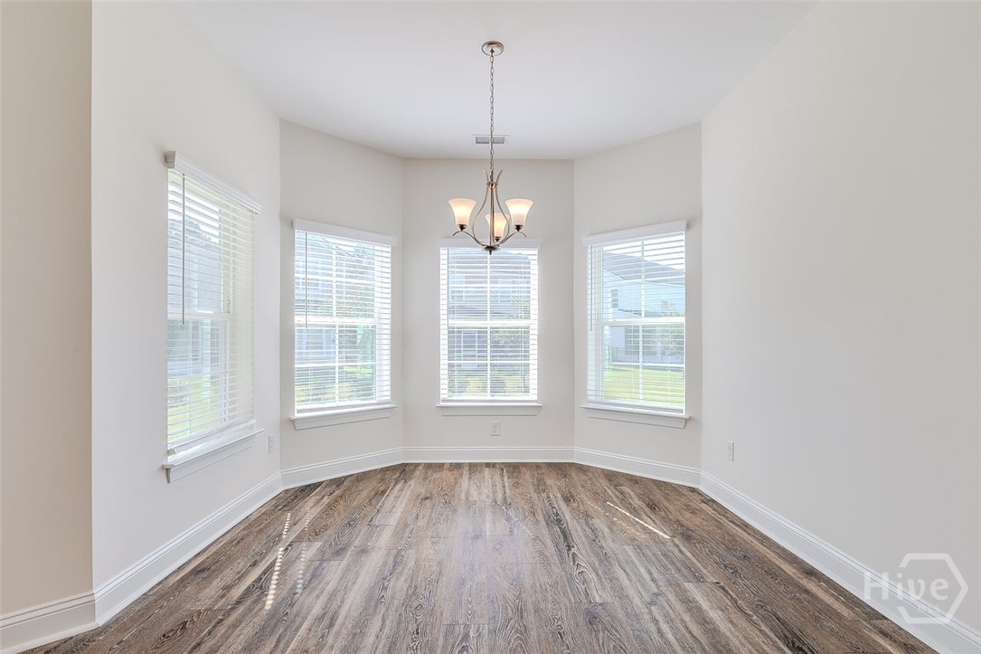 107 Merribee Lane Pooler, GA 31322 - Photo 20 of 46 Just off the kitchen is the dining room area measuring 15'3 X 10'4 with great natural light and a view of the lagoon.