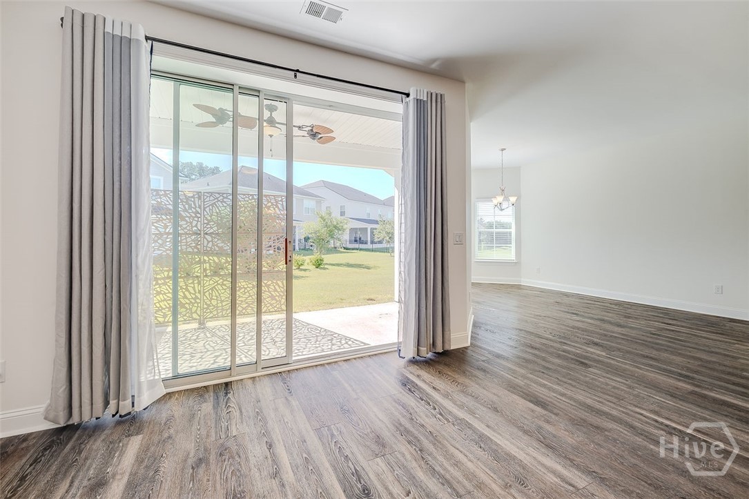 107 Merribee Lane Pooler, GA 31322 - Photo 22 of 46 No-see collapsing triple doors makes indoor-outdoor living a dream!!!