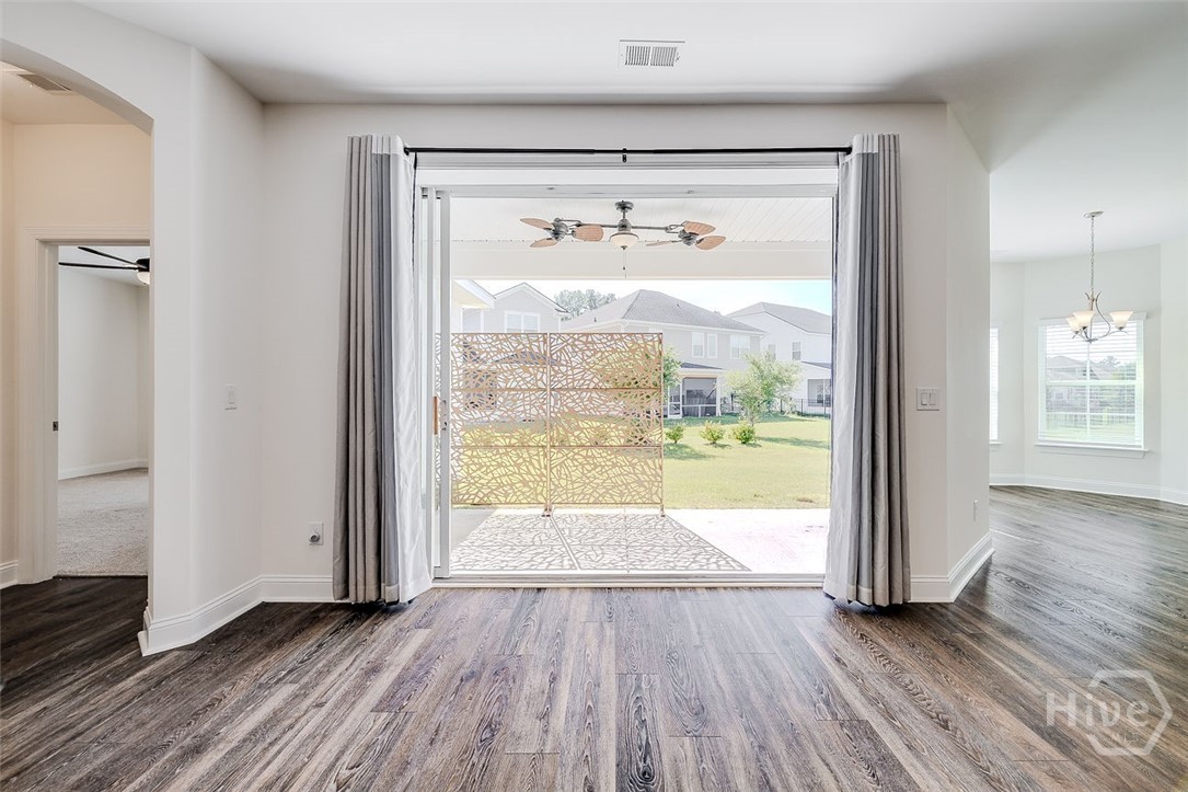 107 Merribee Lane Pooler, GA 31322 - Photo 23 of 46 This shows the doors fully open, and the covered patio could easily be screened in.