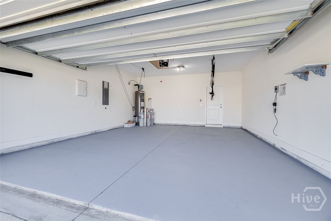 107 Merribee Lane Pooler, GA 31322 - Photo 39 of 46 Freshly painted garage floor, and there are straps for hanging sports equipment.