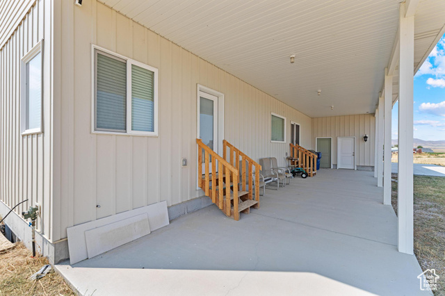 19502 South Olson Road Downey, ID 83234 - Photo 54 of 64 Porch with entry steps and an attached carport