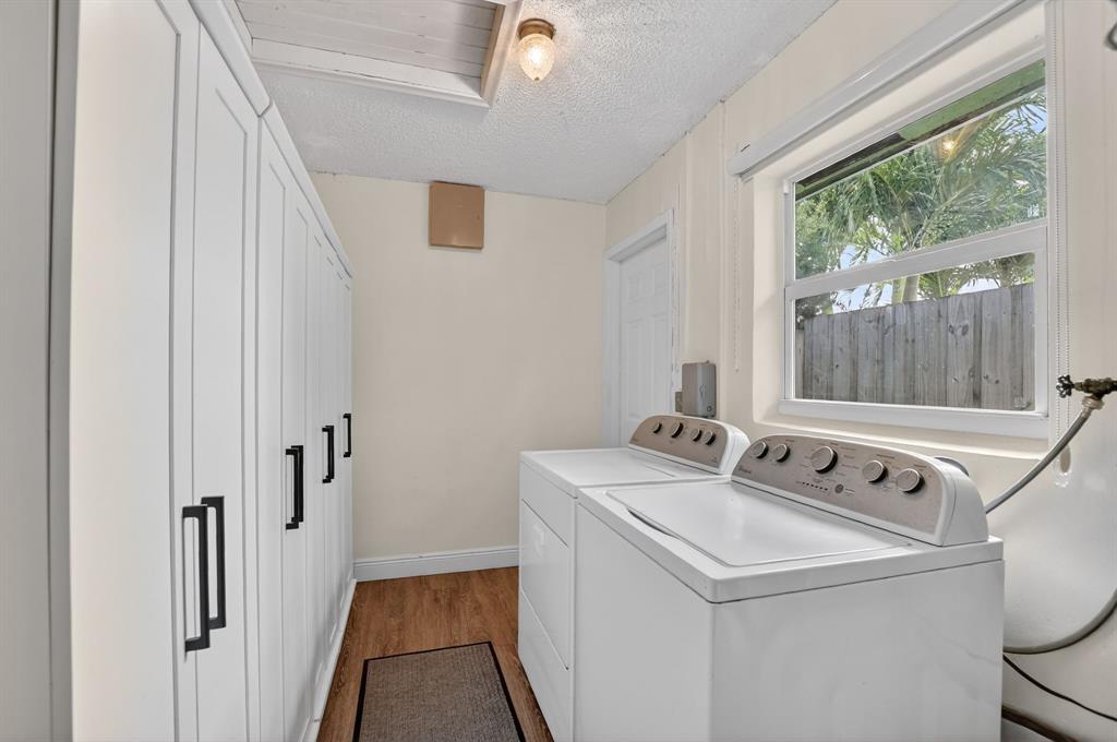 501 Northwest 54th Street Boca Raton, FL 33487 - Photo 17 of 43 a utility room with dryer and washer