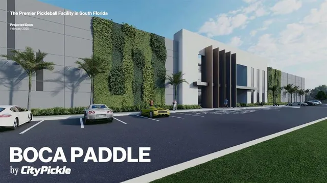 a view of street with tall buildings