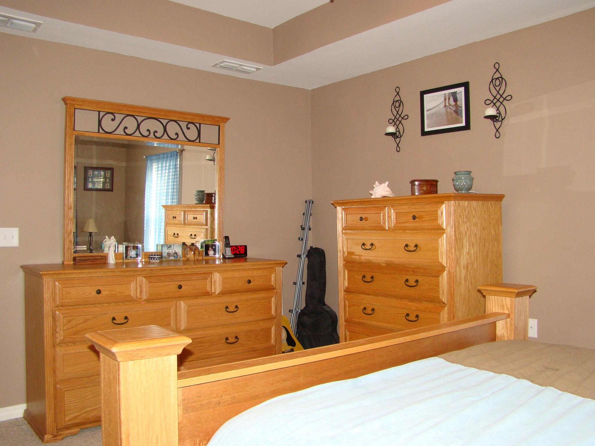 607 Prairie Street Crestview, FL 32536 - Photo 22 of 43 a bedroom with a bed and a dresser