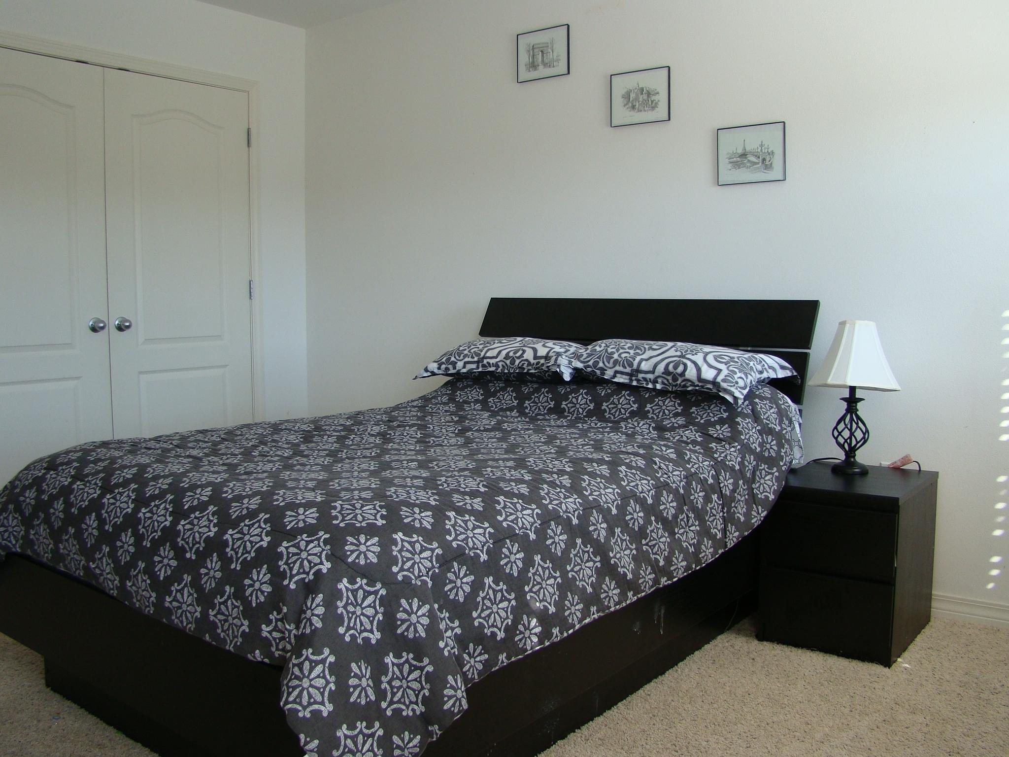 607 Prairie Street Crestview, FL 32536 - Photo 27 of 43 a bedroom with bed and window