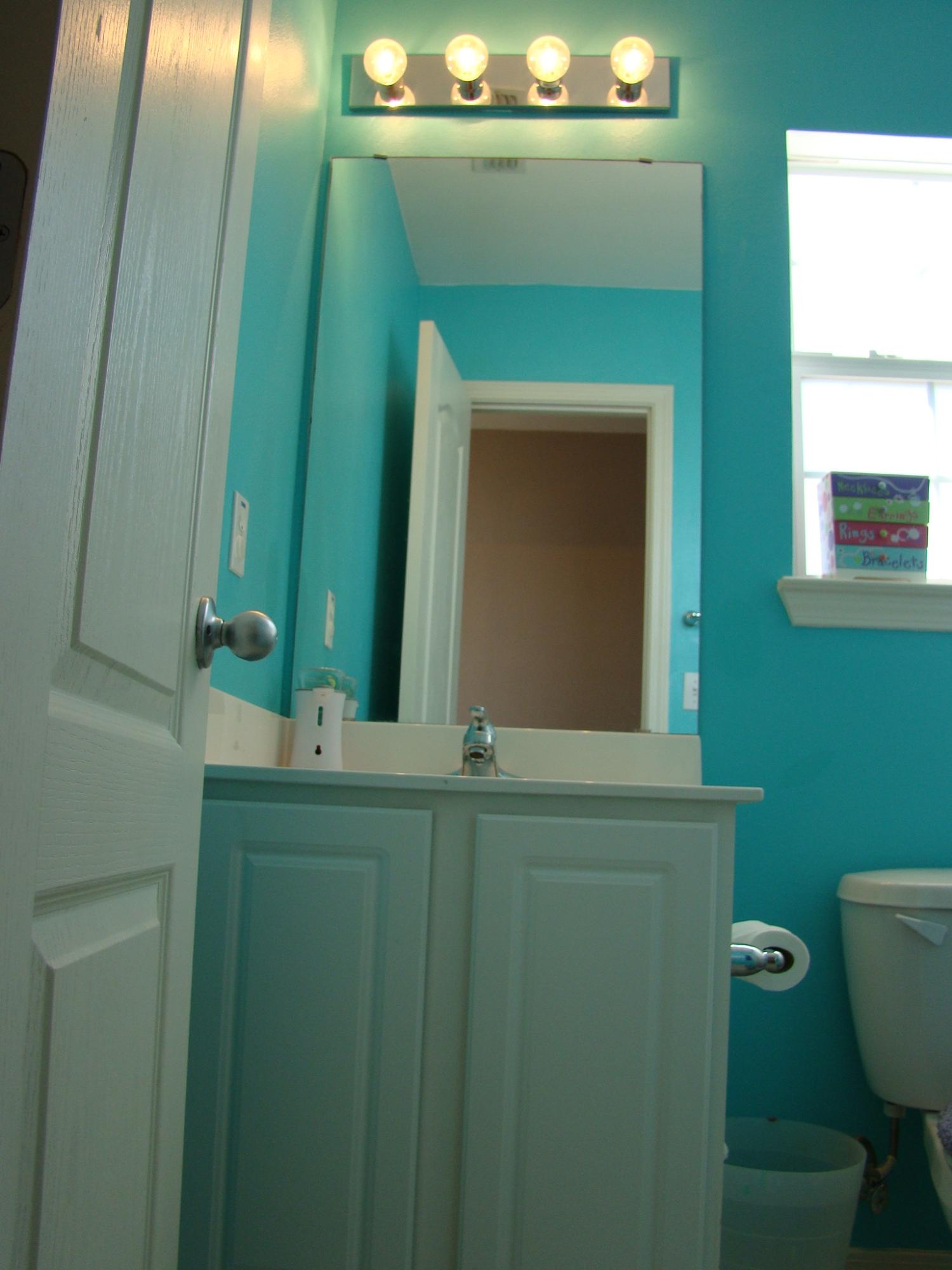 607 Prairie Street Crestview, FL 32536 - Photo 29 of 43 a bathroom with a sink and a mirror