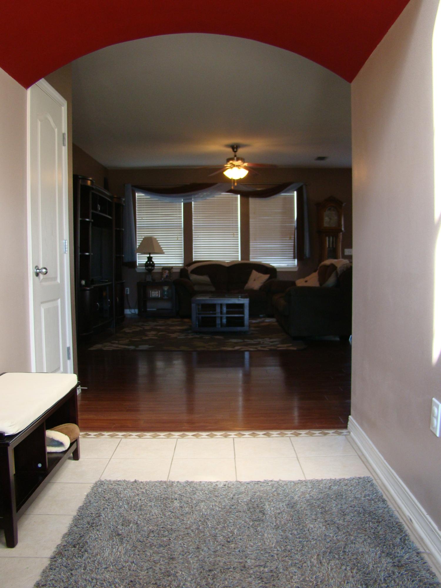 607 Prairie Street Crestview, FL 32536 - Photo 3 of 43 a living room with a table and a large window