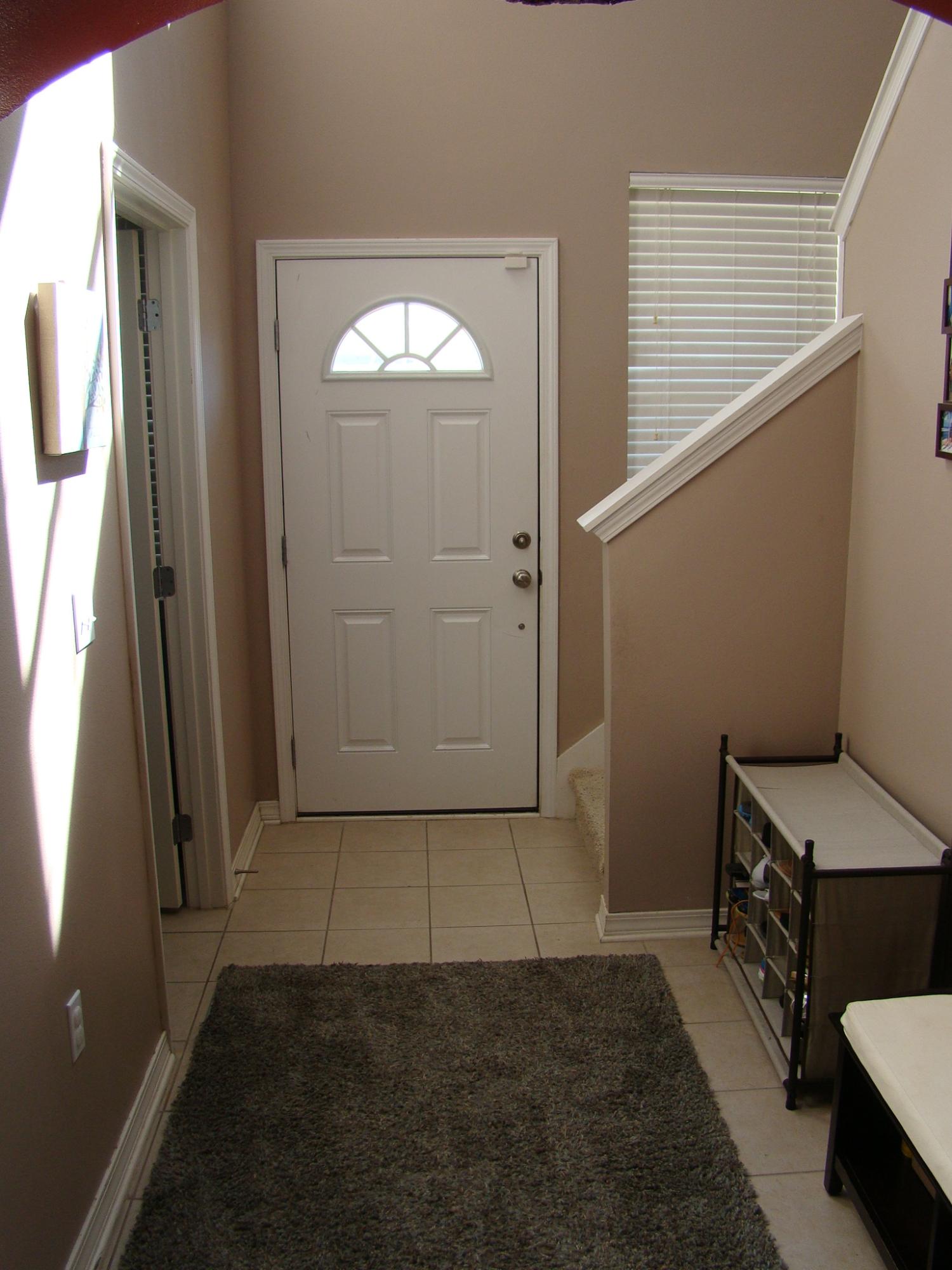 607 Prairie Street Crestview, FL 32536 - Photo 4 of 43 a view of an entryway with a fireplace