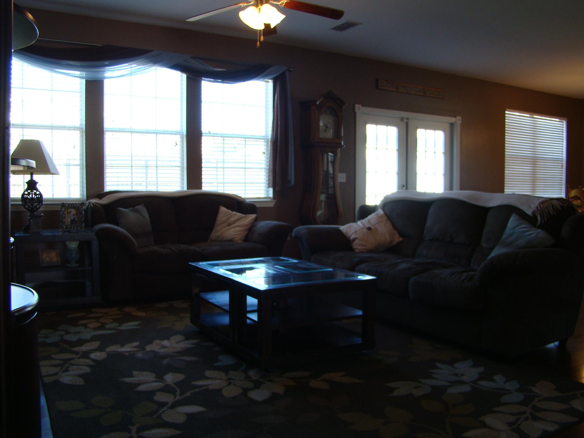 607 Prairie Street Crestview, FL 32536 - Photo 7 of 43 a living room with furniture and a large window