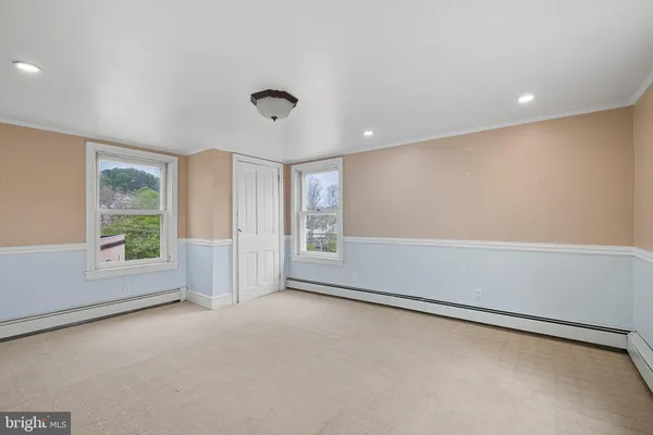 an empty room with windows