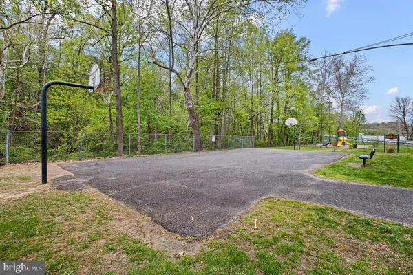 a view of outdoor space with deck and yard