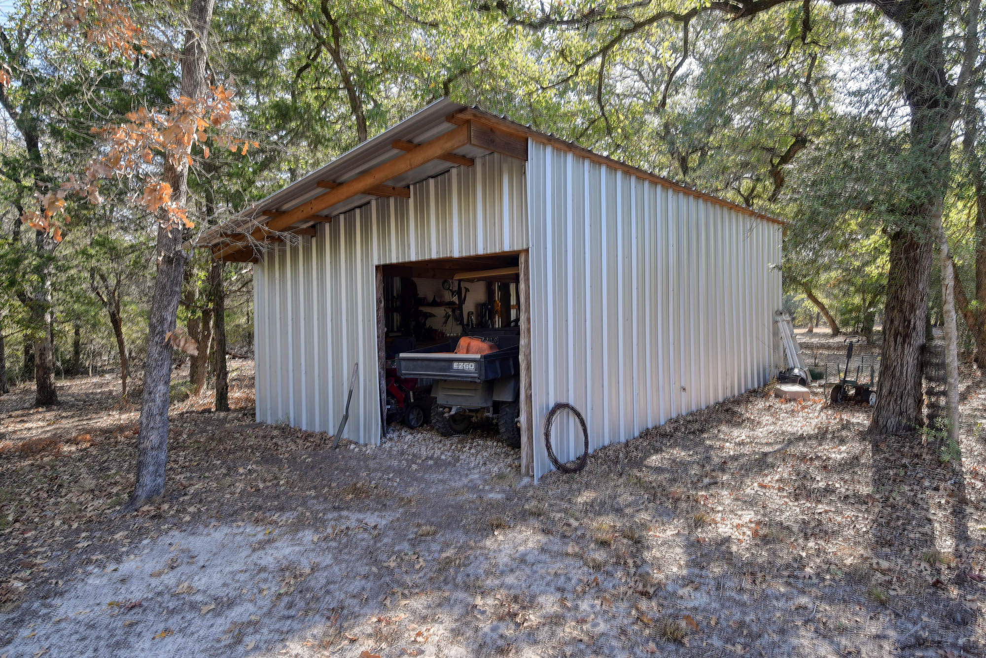 181 Lockwood Road Red Rock, TX 78662 - Photo 29 of 32 a front view of a house with a yard