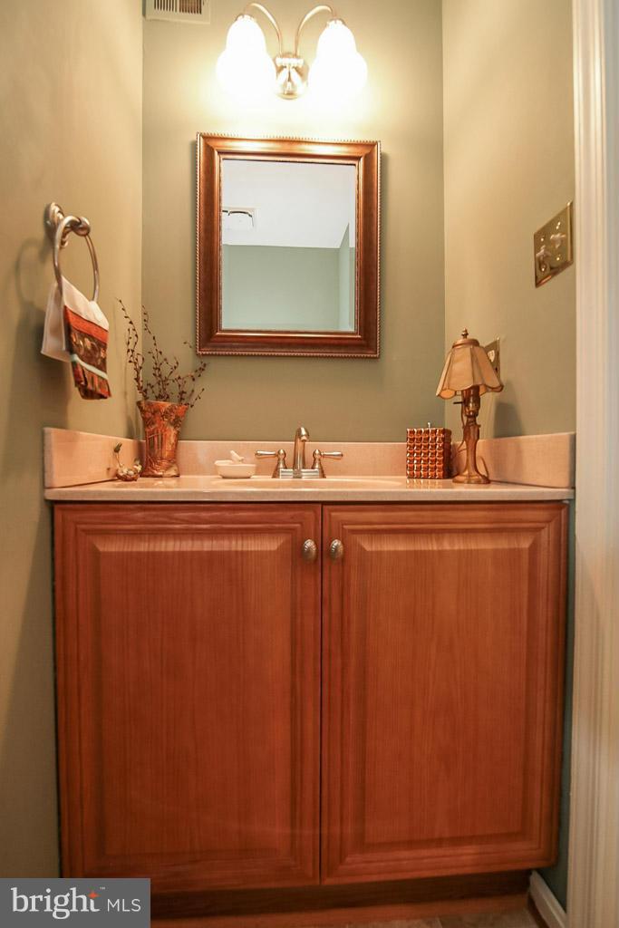 9913 Natick Road Burke, VA 22015 - Photo 13 of 30 Updated powder room on main level