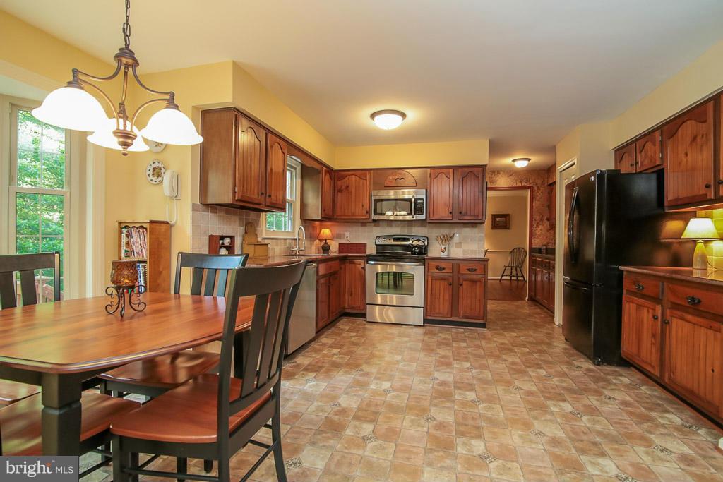 9913 Natick Road Burke, VA 22015 - Photo 8 of 30 Breakfast room opens to kitchen