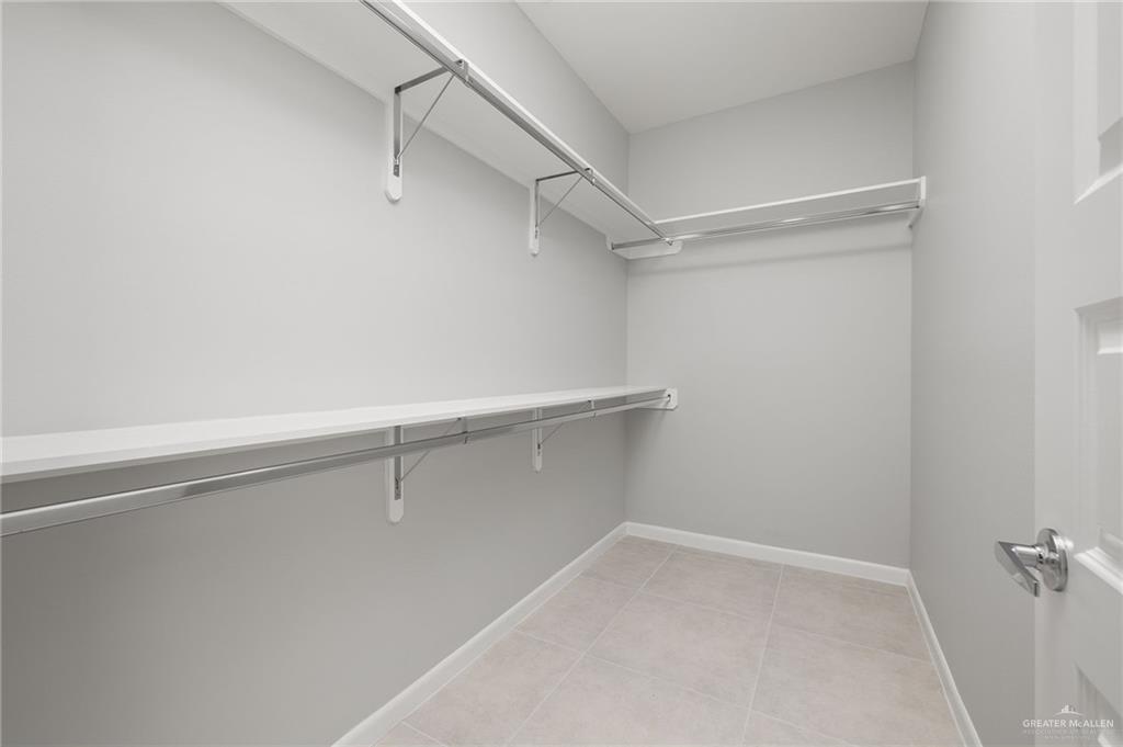 2701 Woodpecker Road, Unit 1 Weslaco, TX 78596 - Photo 14 of 18 a view of an empty walk in closet