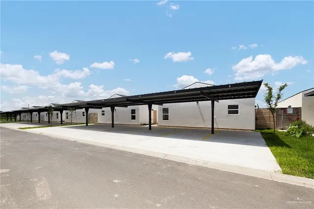 a big house with a yard and garage