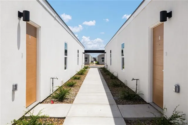 a view of balcony with furniture