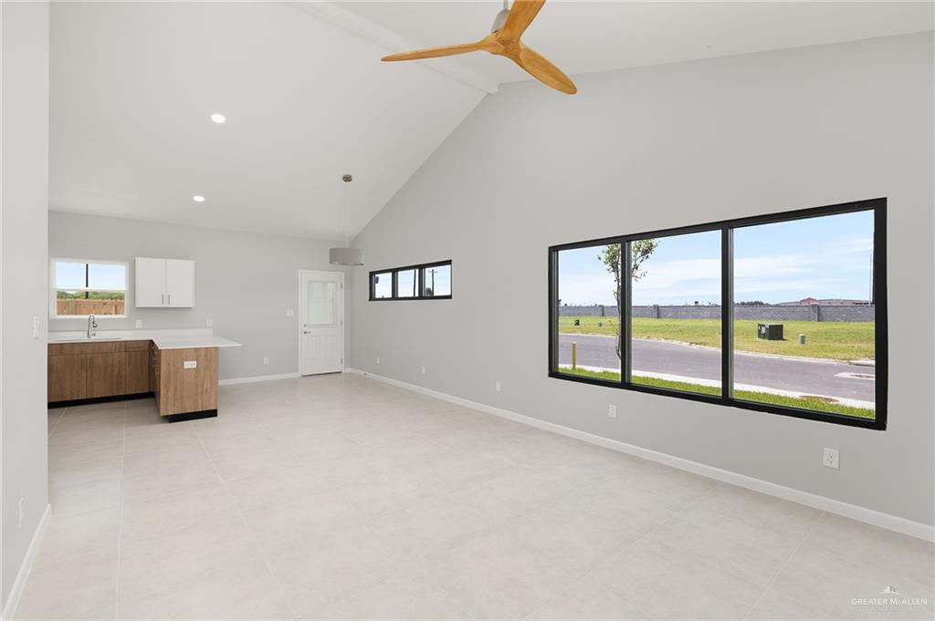 2701 Woodpecker Road, Unit 1 Weslaco, TX 78596 - Photo 5 of 18 a view of an empty room with a window