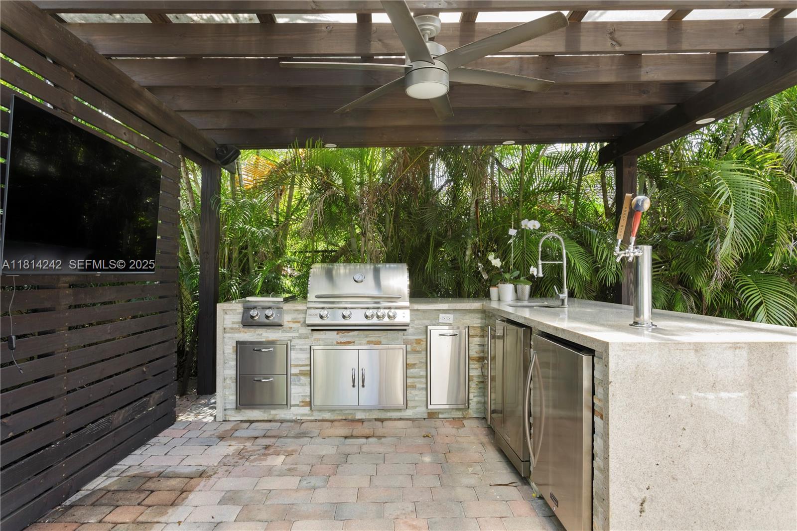 9339 Southwest 98th Place Miami, FL 33176 - Photo 23 of 33 a kitchen with a stove and a microwave oven