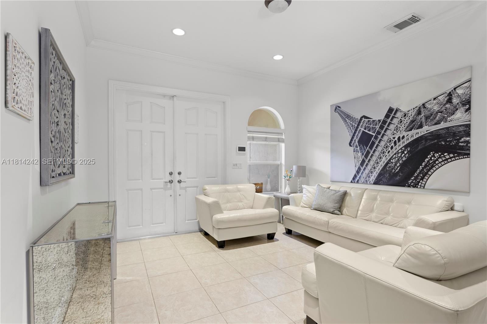 9339 Southwest 98th Place Miami, FL 33176 - Photo 5 of 33 a spacious bedroom with a bed and a couch