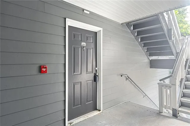 a view of a kitchen from the hallway