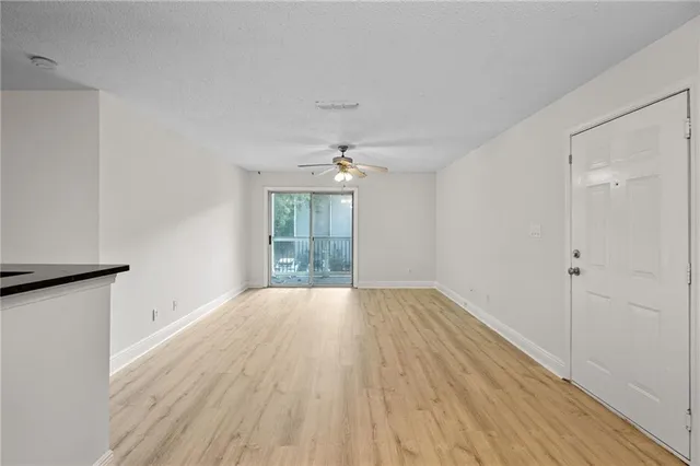 a view of a bathroom with a glass door