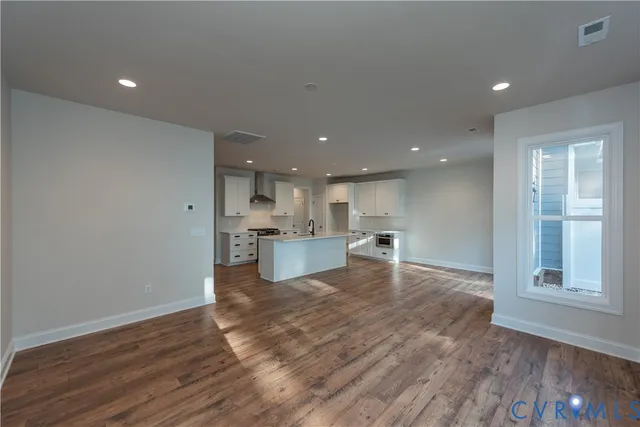 a view of kitchen with wooden floor