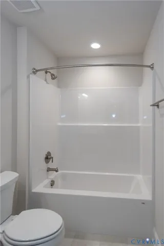 a bathroom with a sink toilet tub and shower
