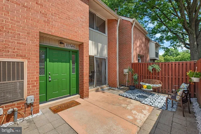 a backyard of a house with seating space